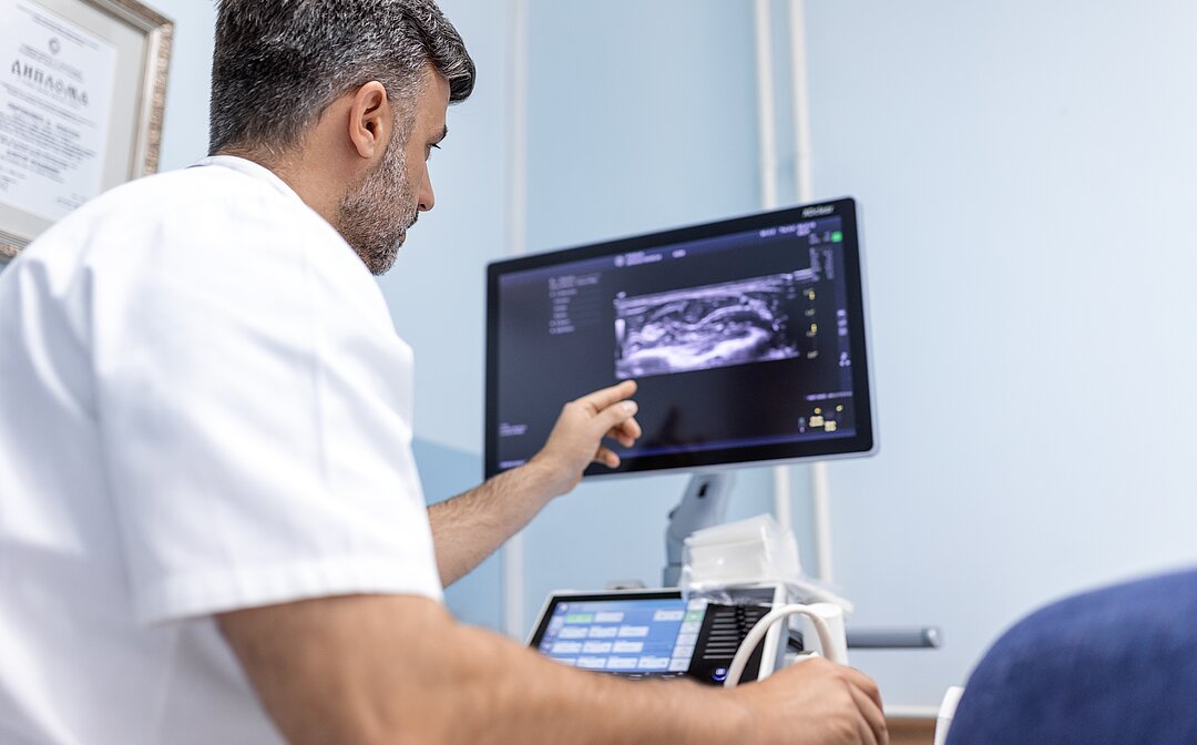 Doctor looking at screen